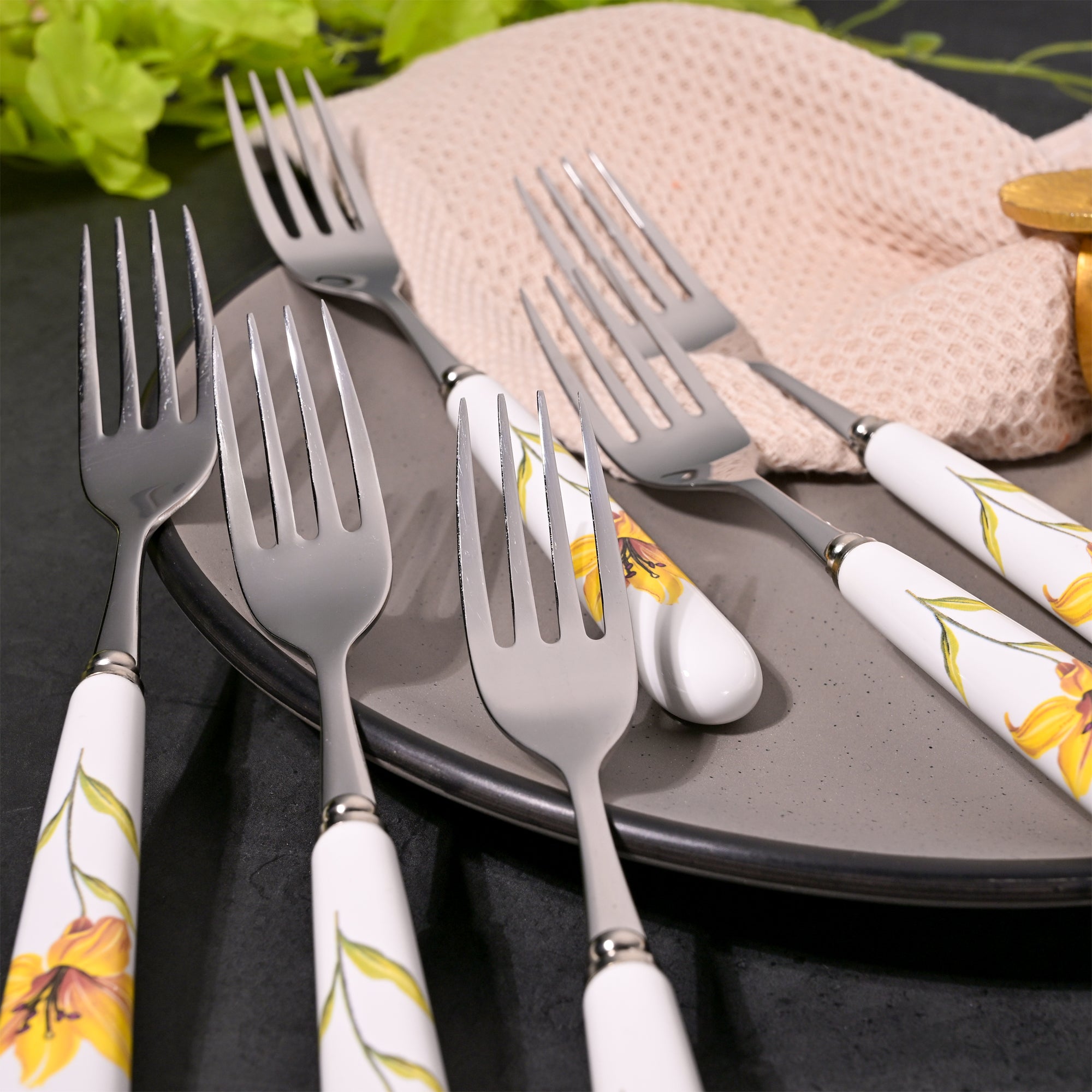 Floral ceramic-handled steel forks

