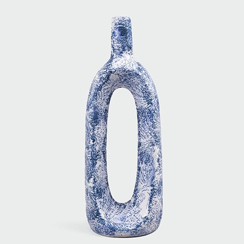 Elegant blue ceramic hollow vase for home decor

