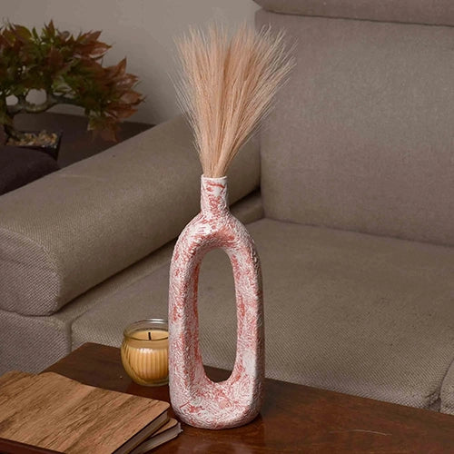 Ceramic coral hollow flower vase with modern sculptural design

