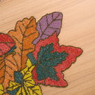 Elegant handcrafted table mat with vibrant colors
