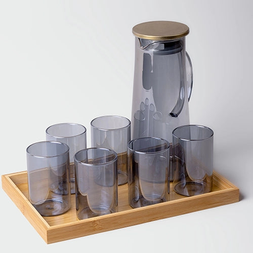 Elegant glass water carafe with golden lid for everyday use

