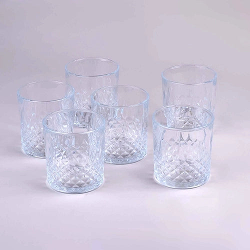 Six classic whiskey glasses displayed on a table

