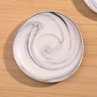 Cloud Grey Tea Kettle Set Displayed on a Dining Table