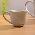 Cloud Grey Tea Kettle Set Styled with Tea Cups for Serving