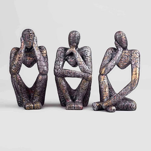 Copper Thinking Trios set featuring three seated meditation-style figures


