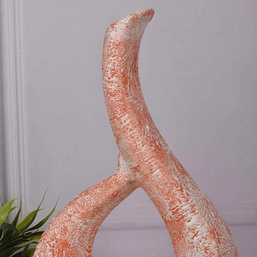 Stylish ceramic vase with a vibrant coral and white finish

