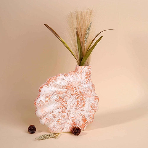 Coral blush shell flower vase with elegant decorative design

