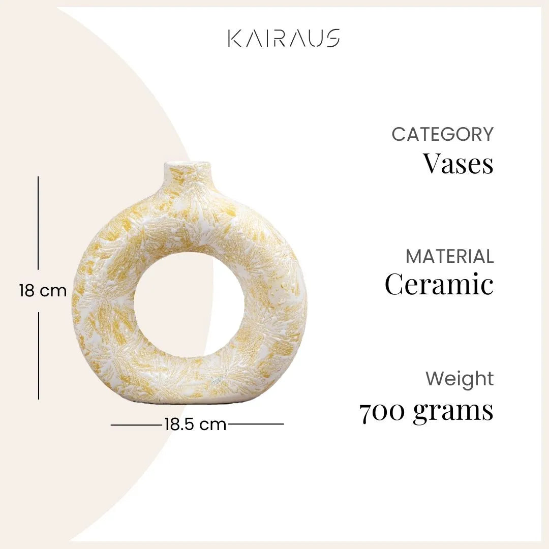 Minimalist cream donut-shaped vase with unique design


