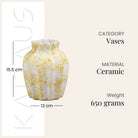 Textured cream vase with unique scalloped detailing

