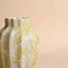 Stylish scalloped vase in a soft cream finish

