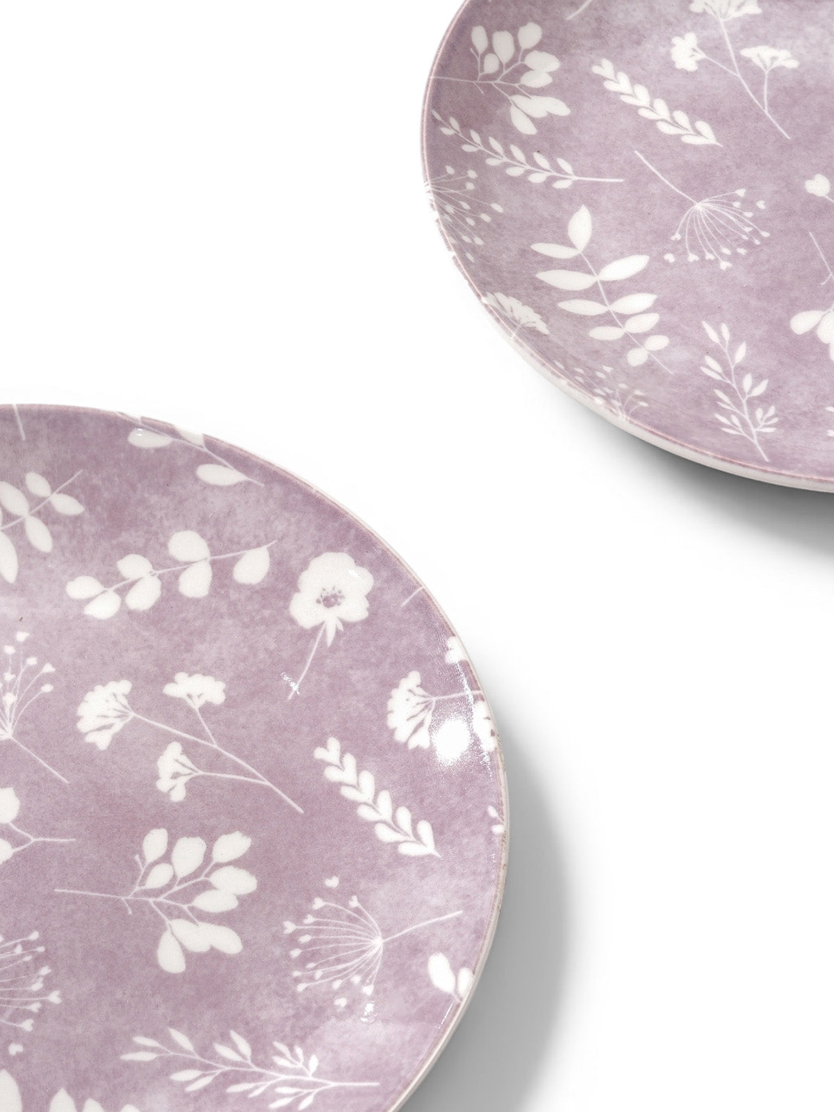 Set of 4 porcelain side plates for elegant dining
