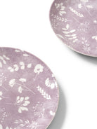 Set of 4 porcelain side plates for elegant dining
