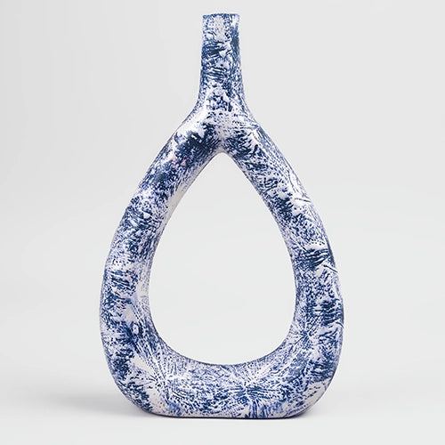 Elegant deep blue triangle vase featuring a textured finish

