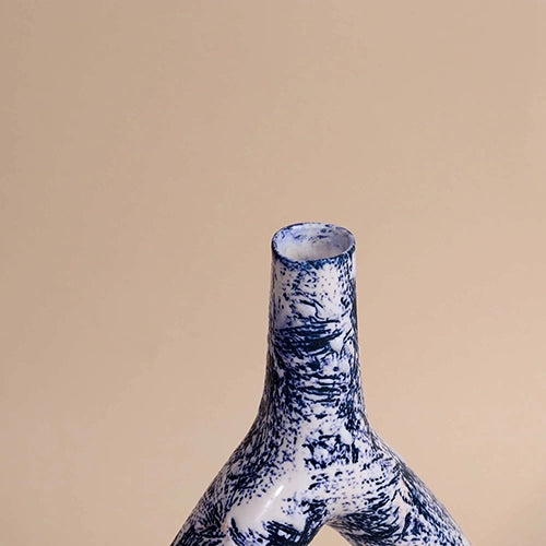Sculptural triangle vase in a rich deep blue finish

