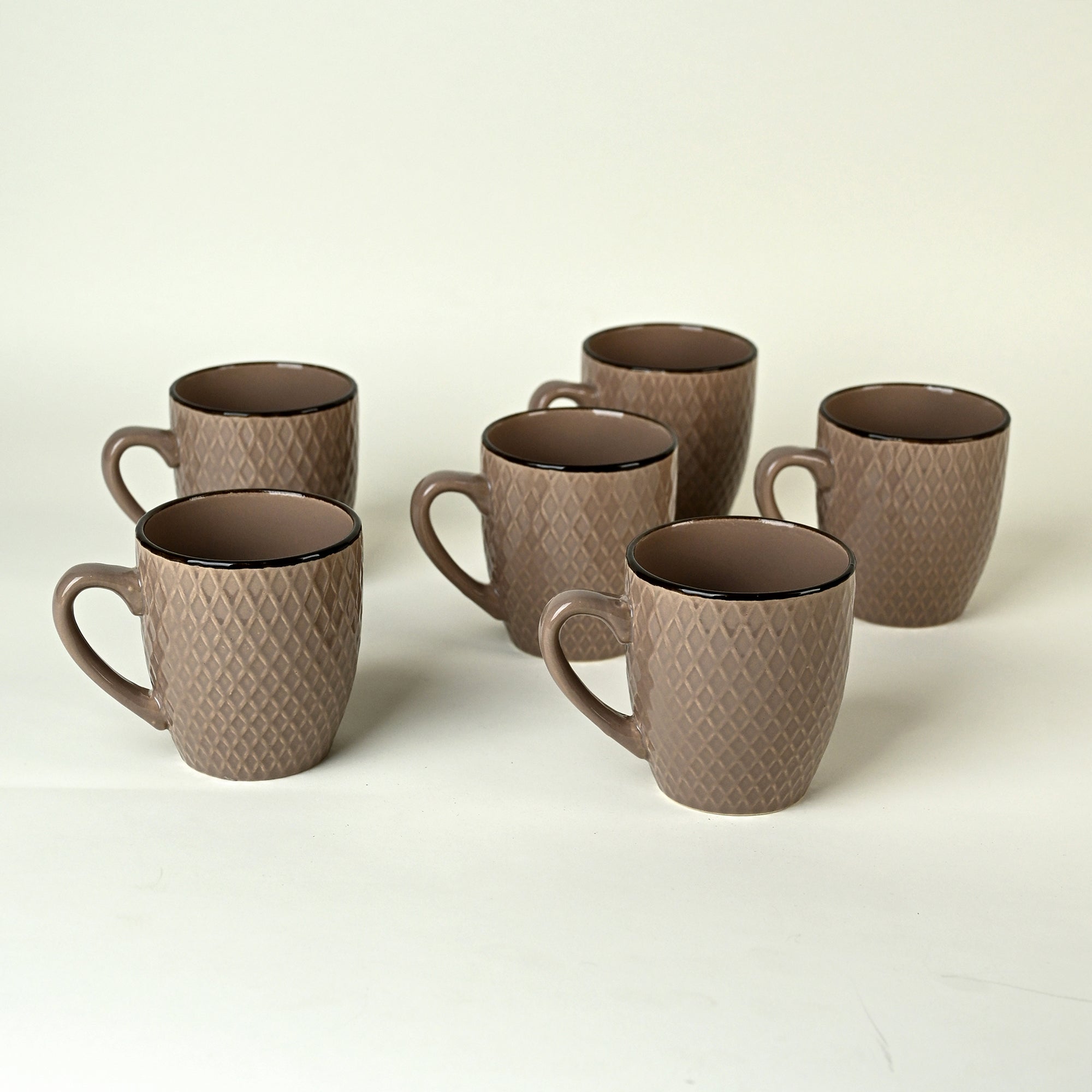 Earthy brown patterned ceramic mugs

