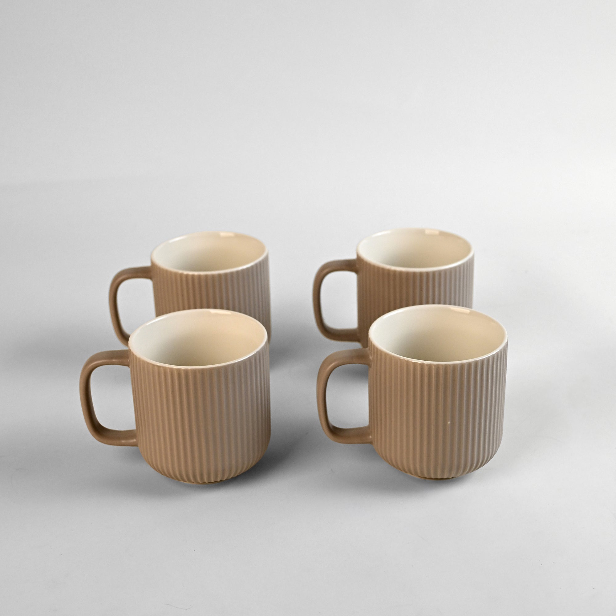 Earthy ribbed bone china coffee mugs

