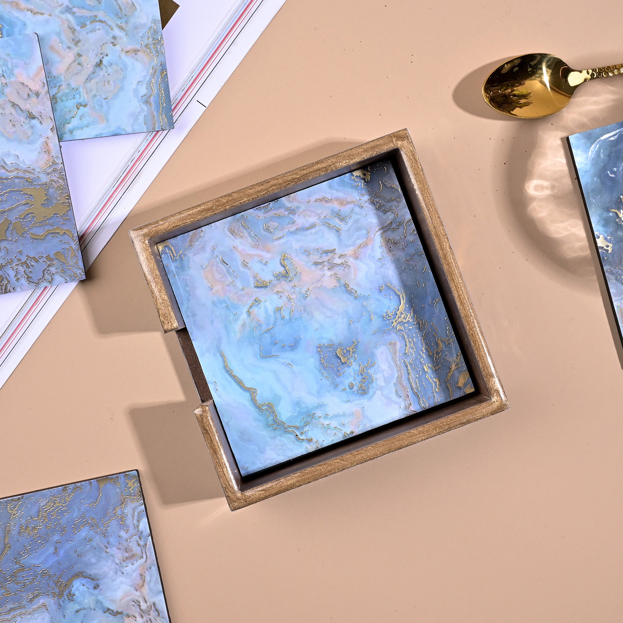 Blue wooden table coasters arranged together

