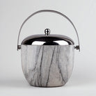 Elegant Steel Ice Bucket Displayed on a Dining Table