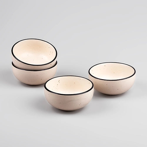 Set of four black matte ceramic serving bowls

