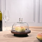 Clear glass cloche with natural wooden base tray

