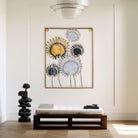 Luxury gold and black wall decor with intricate metal detailing

