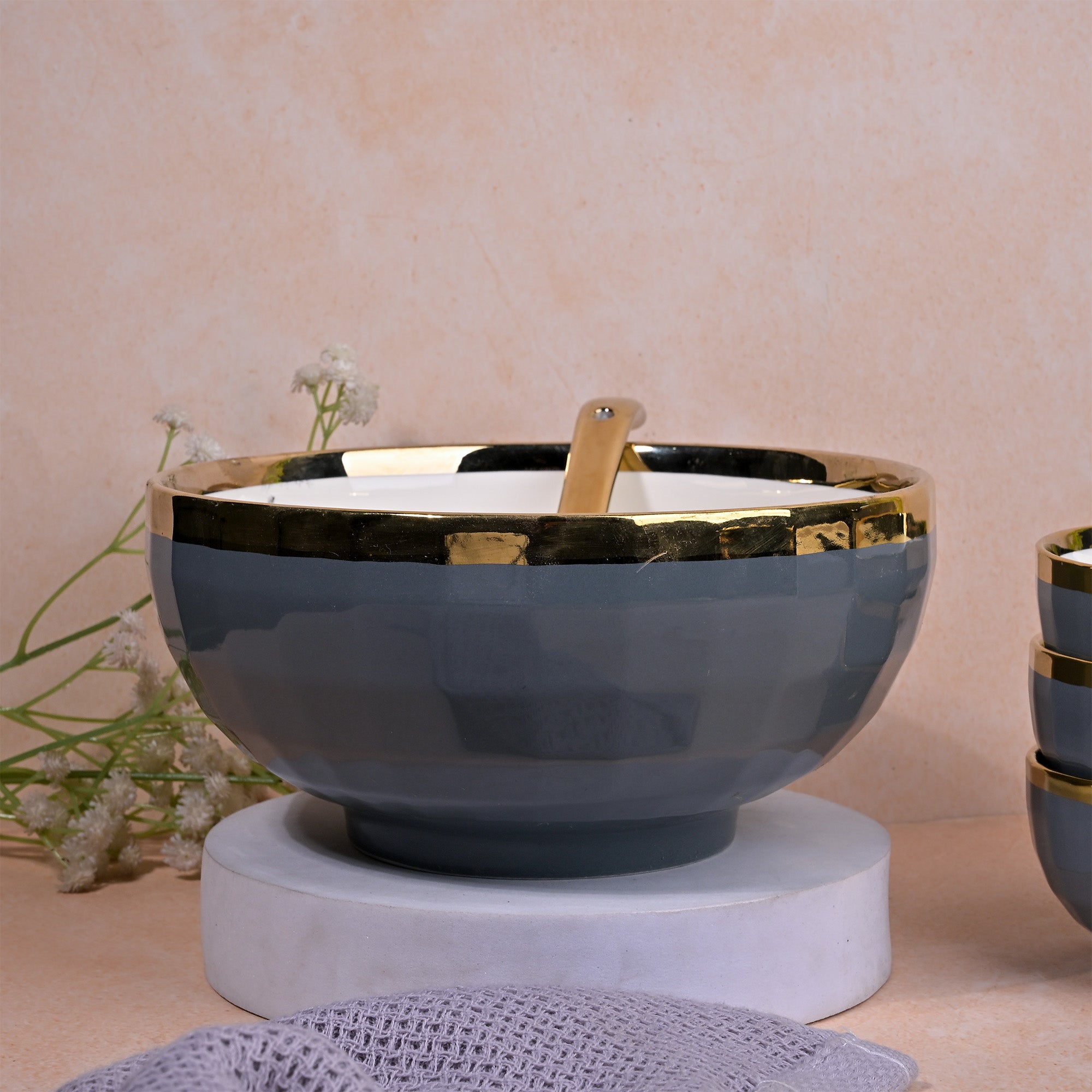 Stylish grey and gold bowls for dining and serving

