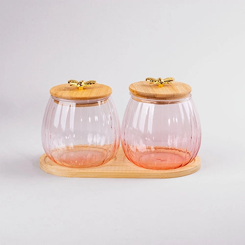 Clear glass storage jar with natural wooden lid

