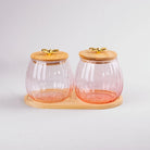 Clear glass storage jar with natural wooden lid
