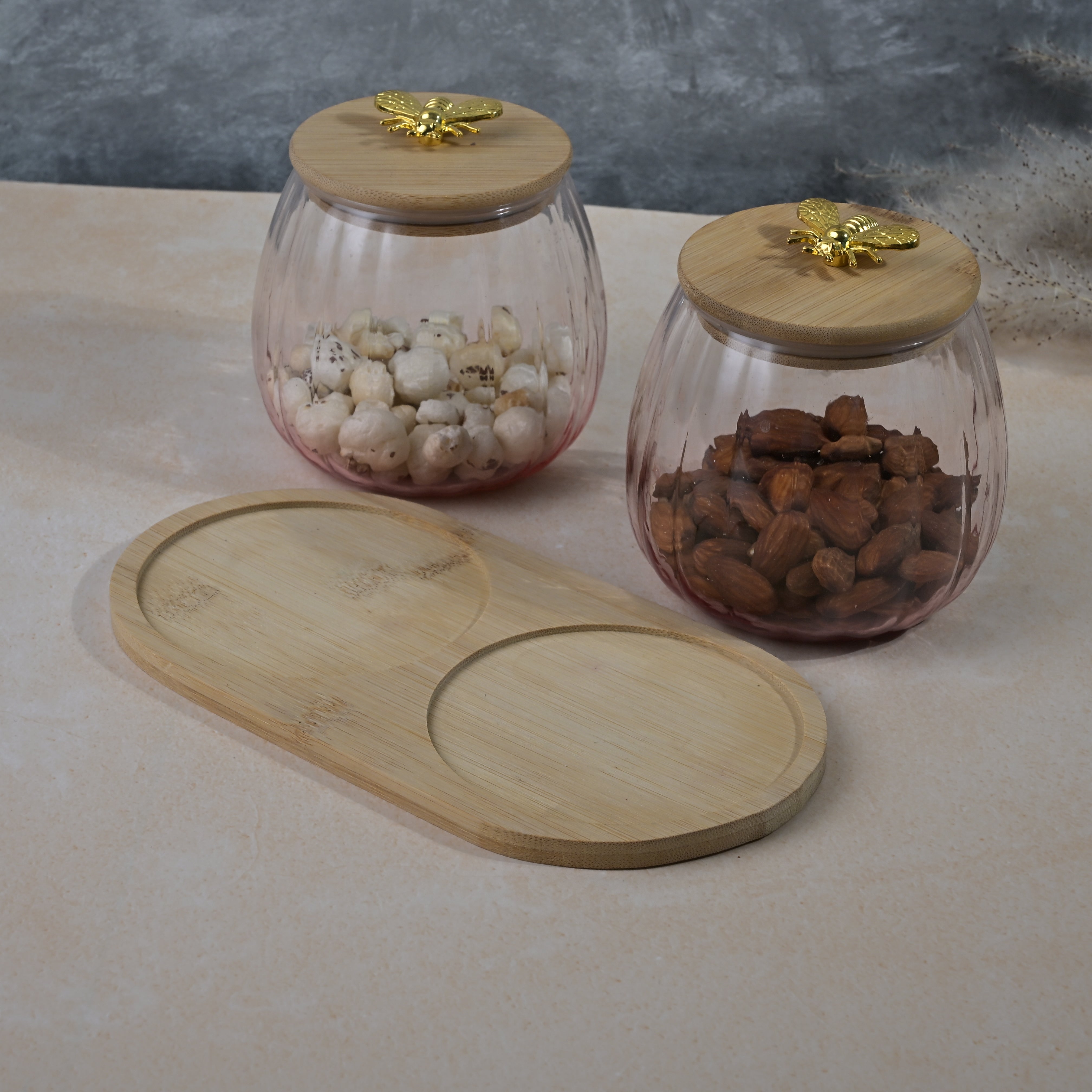 Clear kitchen storage jar with wooden lid
