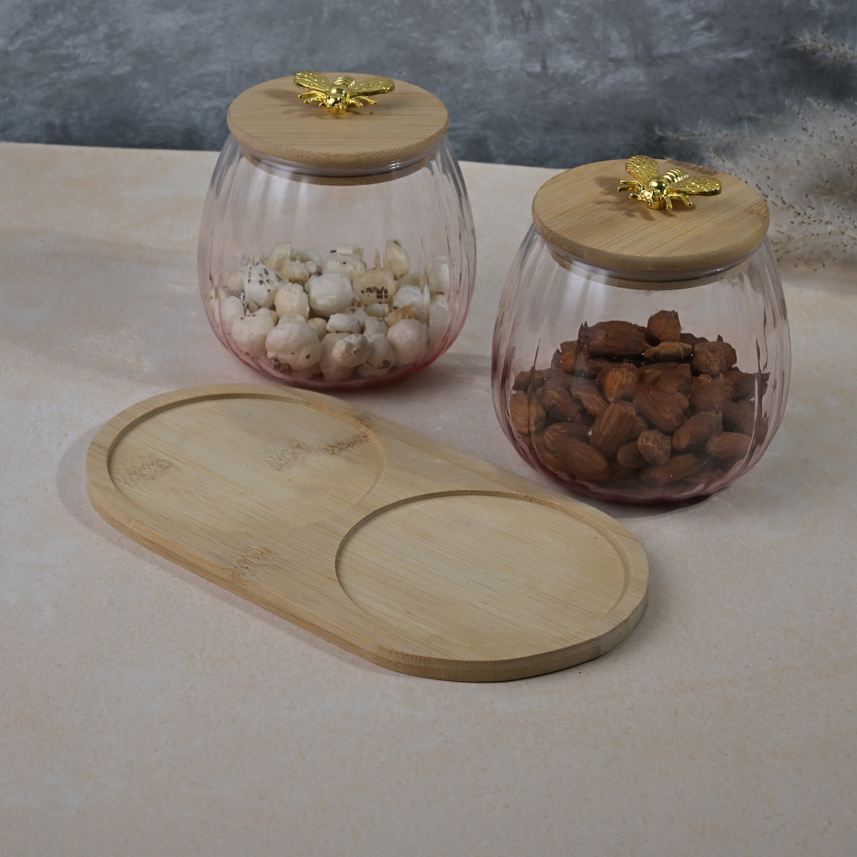 Clear kitchen storage jar with wooden lid
