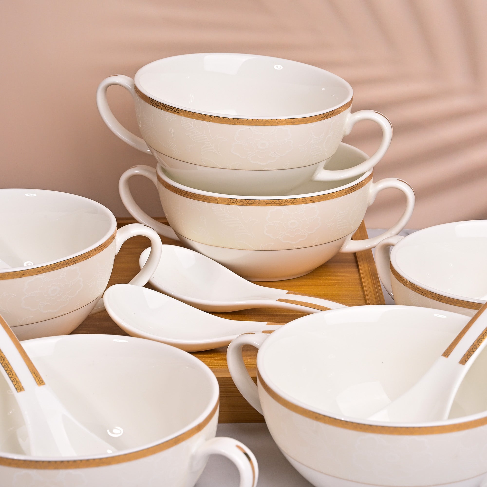Minimalist white porcelain bowls and spoons for everyday dining

