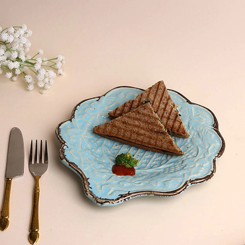 Decorative pale aqua serving platter with embroidery design


