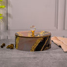 Exquisite black and golden storage box with elegant design

