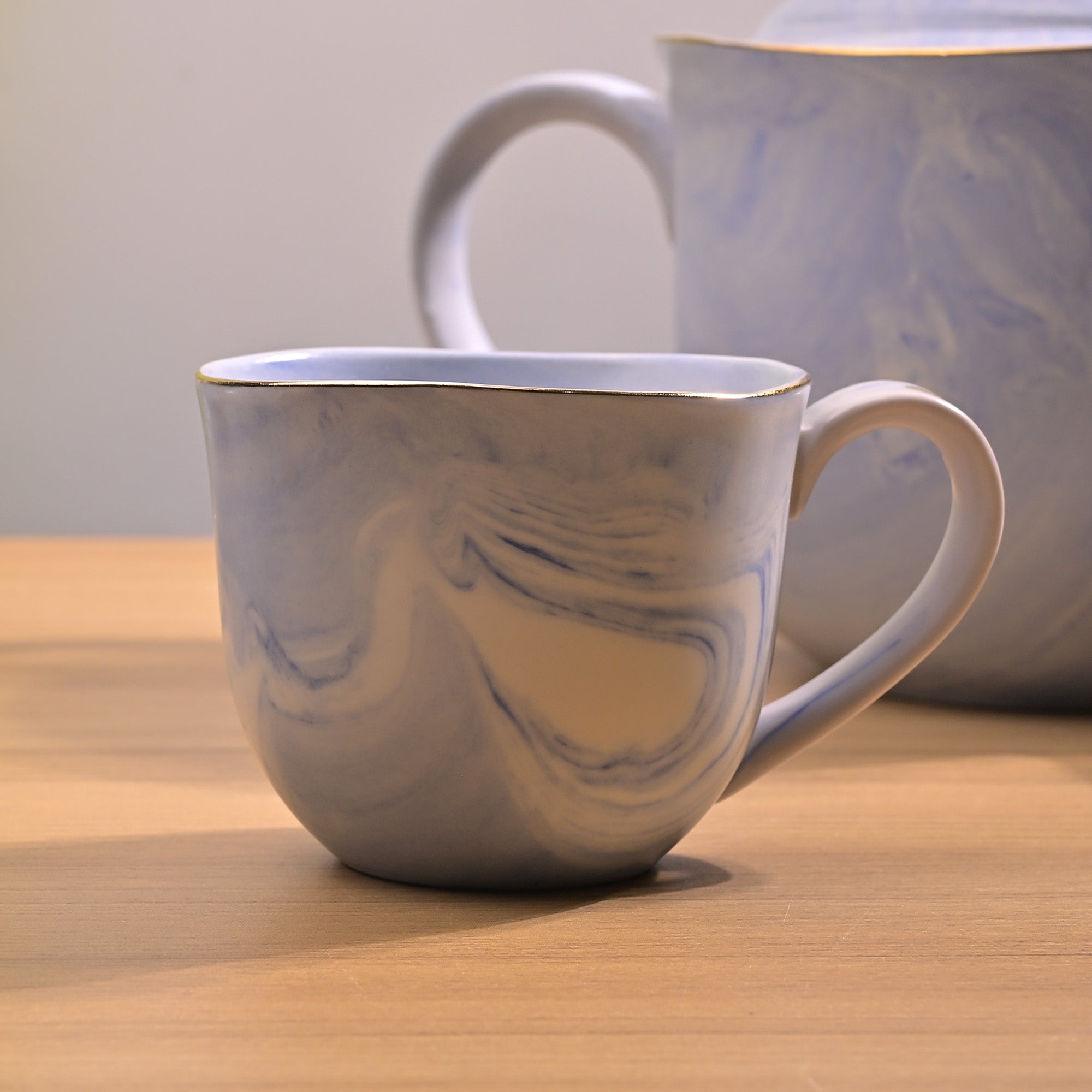Decorative faded blue tea set

