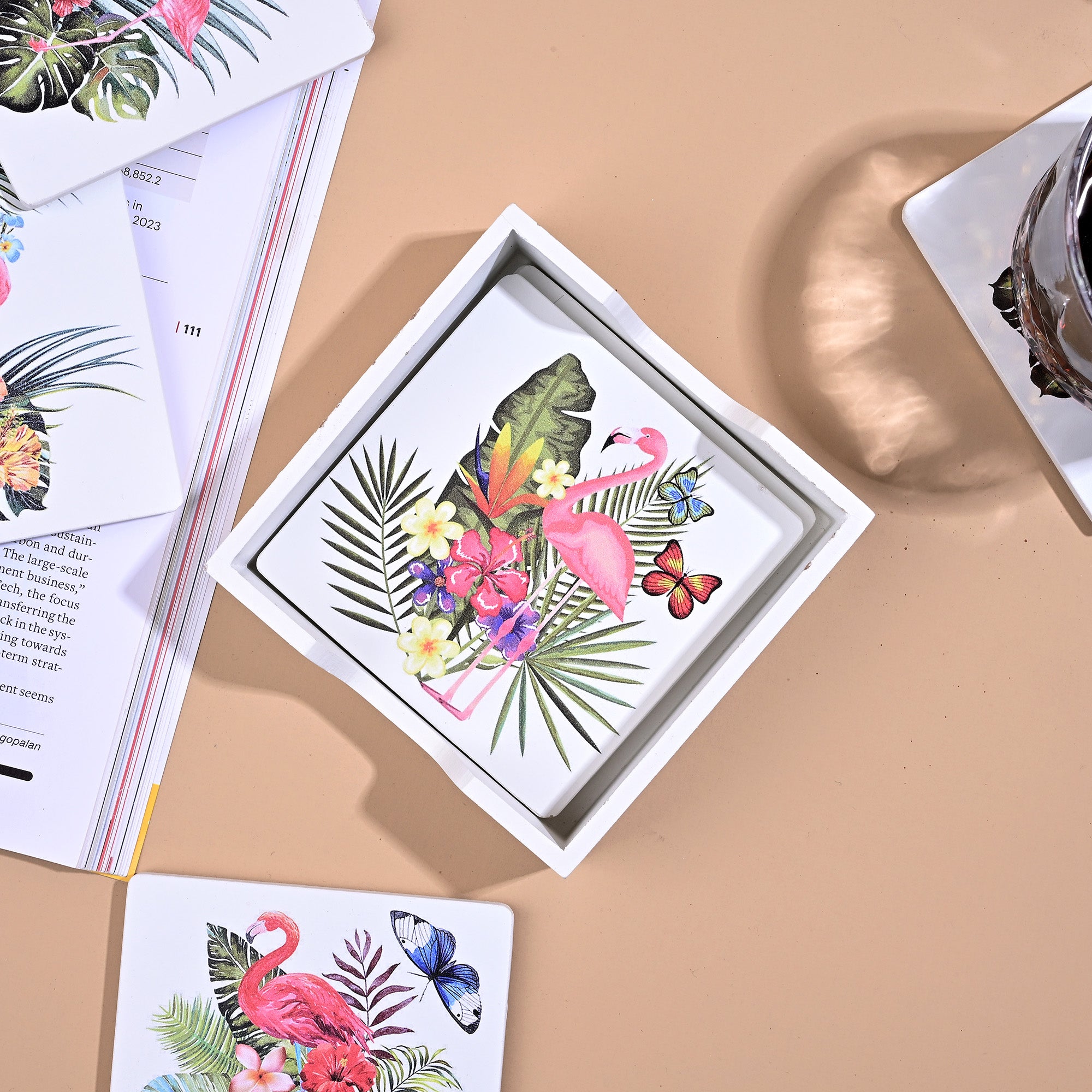 Flamingo-themed wooden coasters arranged together

