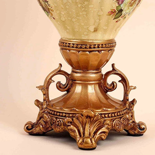 Antique vase showcasing detailed floral embellishments

