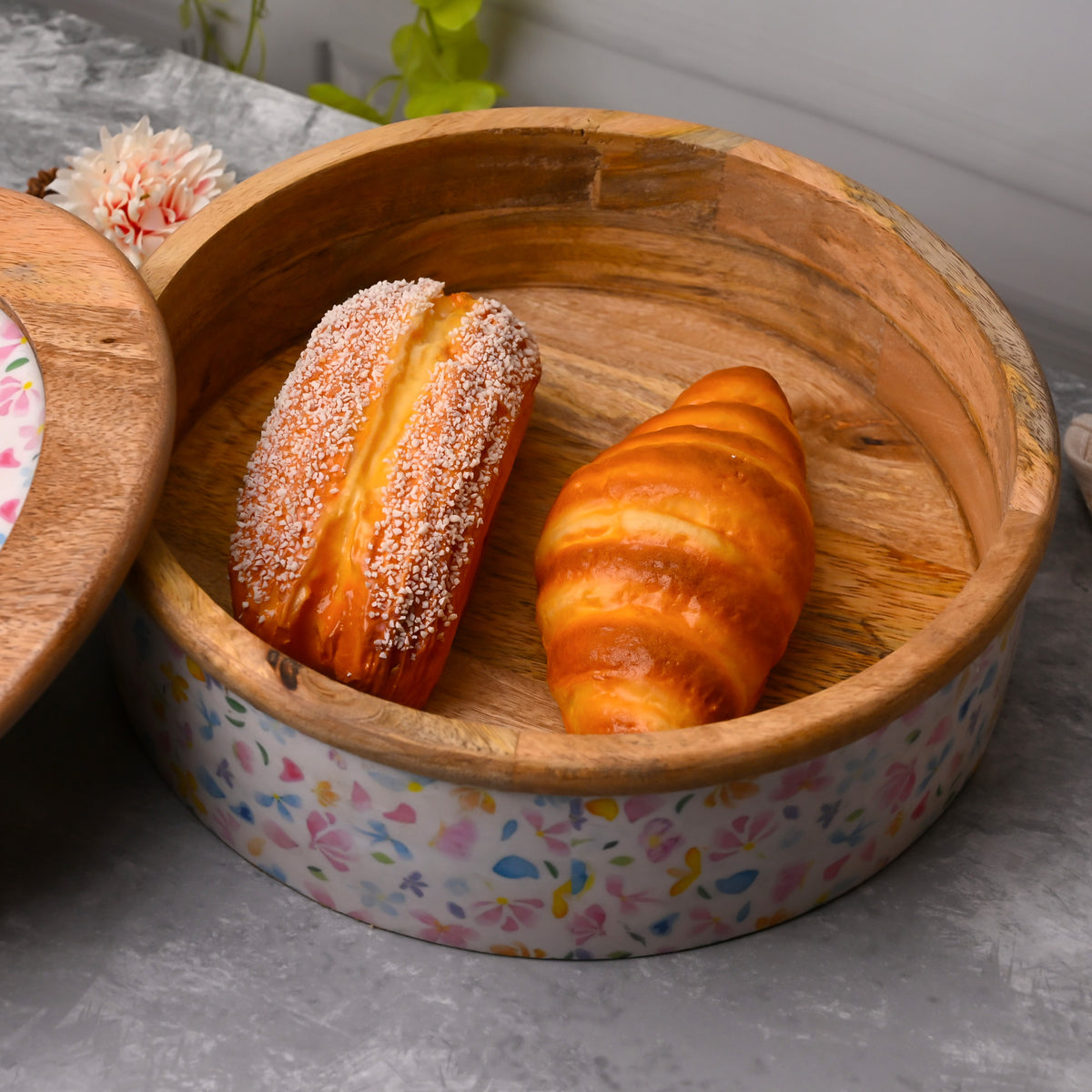 Floral handcrafted casserole for dining table presentation

