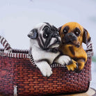 Decorative pair of pug figurines symbolizing friendship

