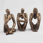 Decorative gold thinking figurines for living room styling

