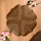 Golden-brown handcrafted table mat for elegant dining
