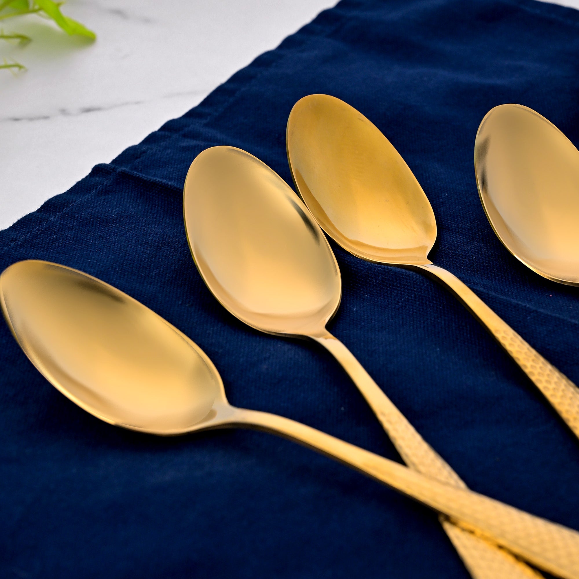 Golden Hammered Spoons Set of 4 for Stylish Dining

