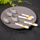 Golden daffodil ceramic-handled spoons set of 4

