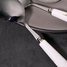 Ceramic-handled spoons with daffodil design

