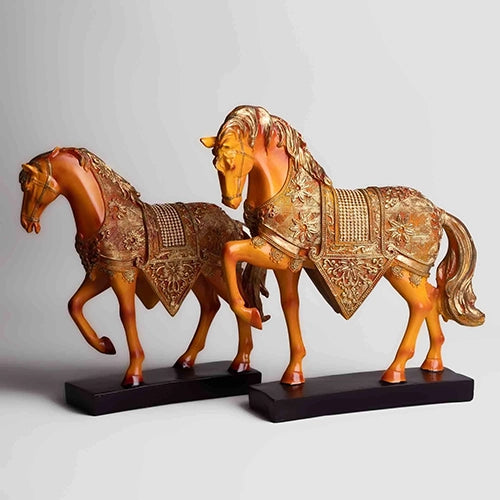 Elegant pair of gold horse sculptures for interior decor


