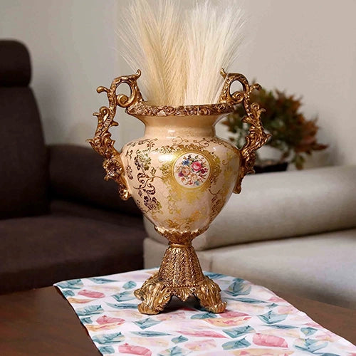 Grand Baroque brass vase with ornate decorative detailing

