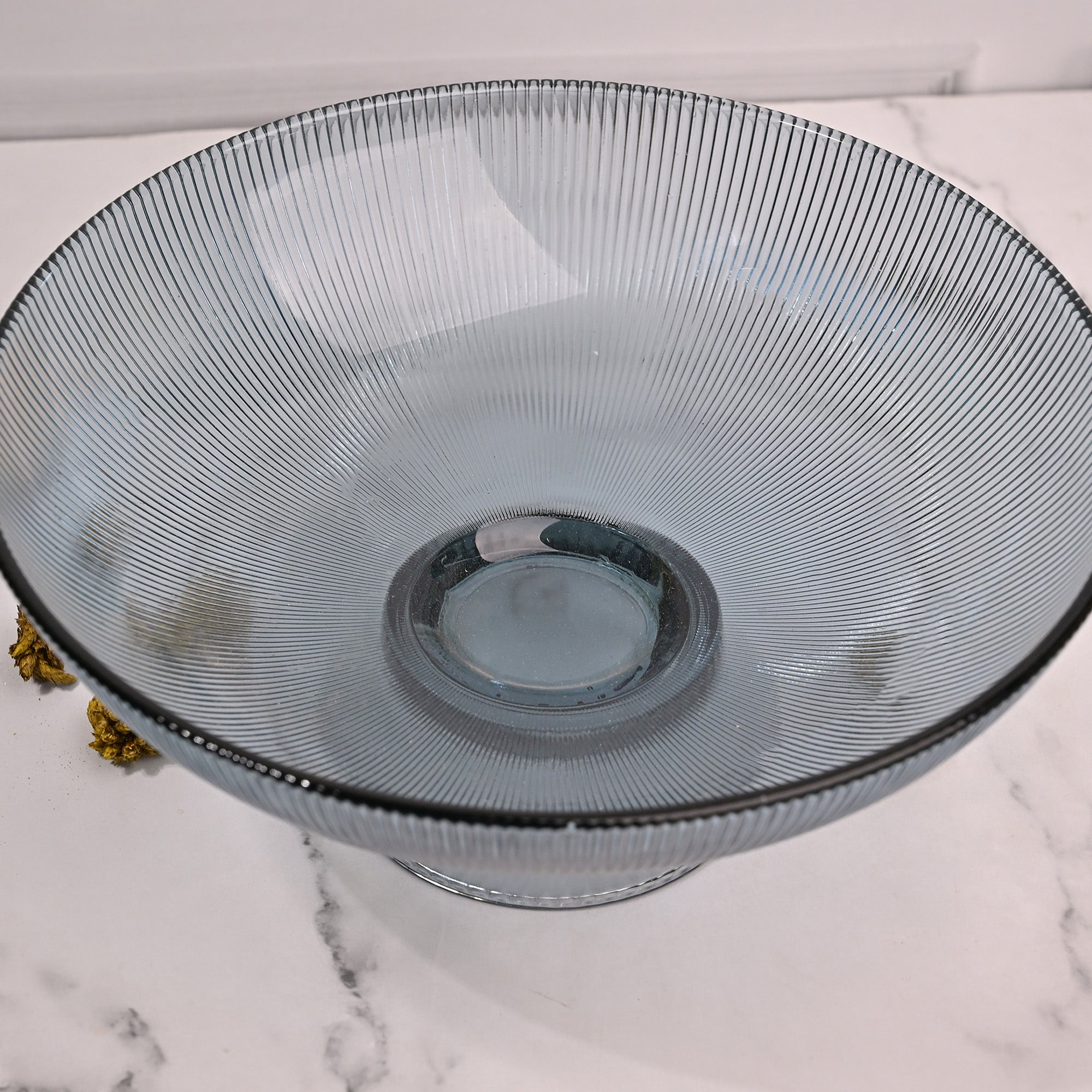 Stylish grey tinted bowl for serving fresh fruits

