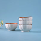 Stylish set of four ribbed porcelain bowls

