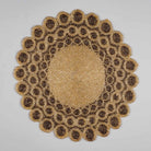Handmade beaded table mat with decorative detailing
