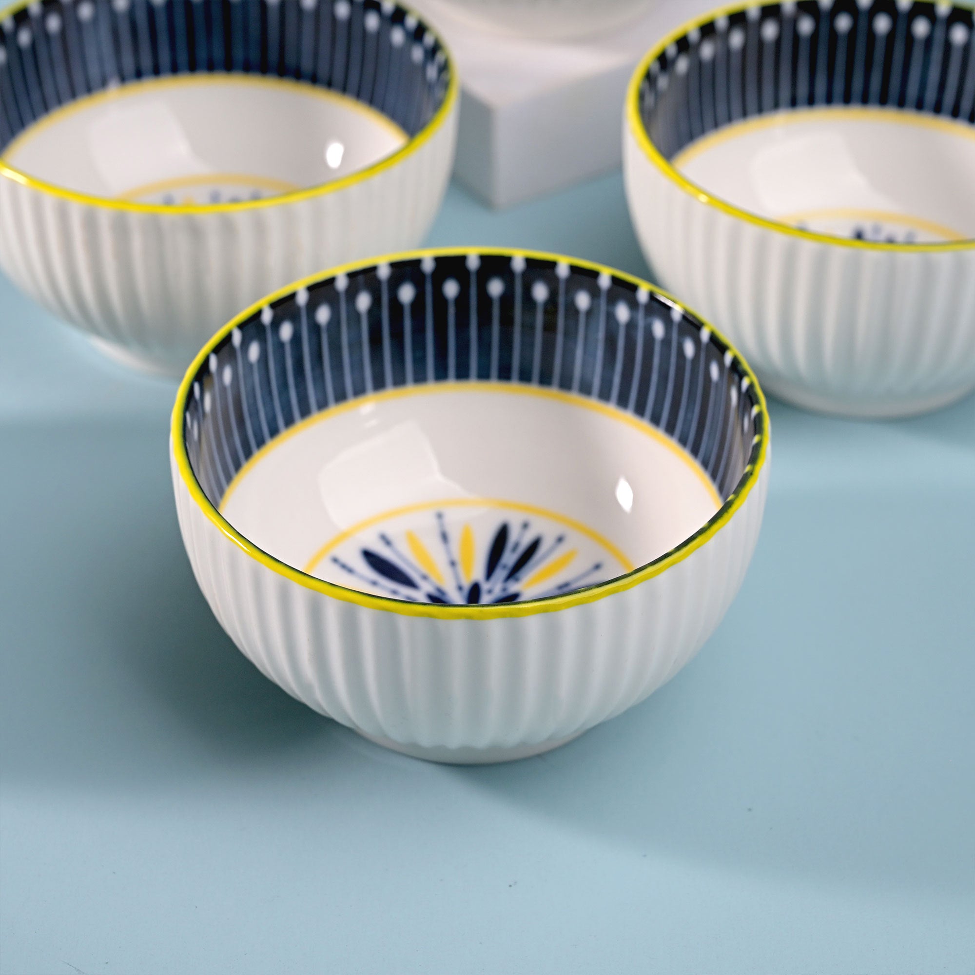 Unique handpainted porcelain serving bowls with artistic design

