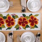 Hibiscus hand-beaded table mat for elegant dining
